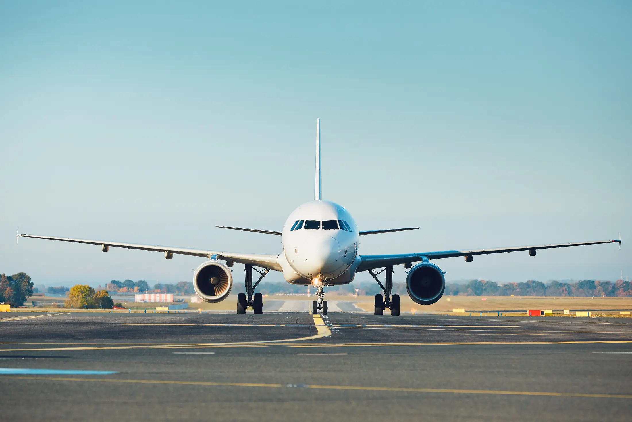 Commercial jet taxiing on the runway
